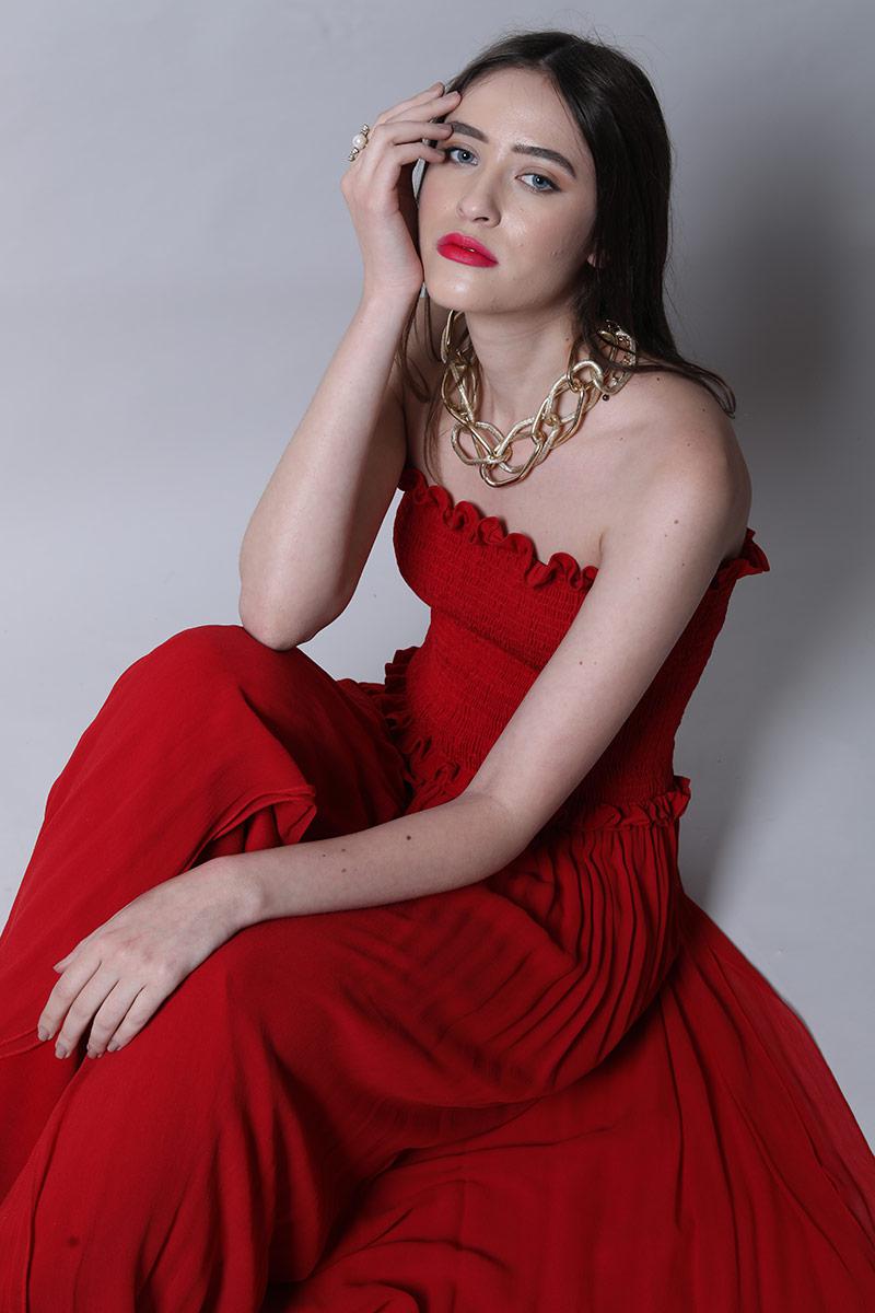 Smocked body jumpsuit with drapes