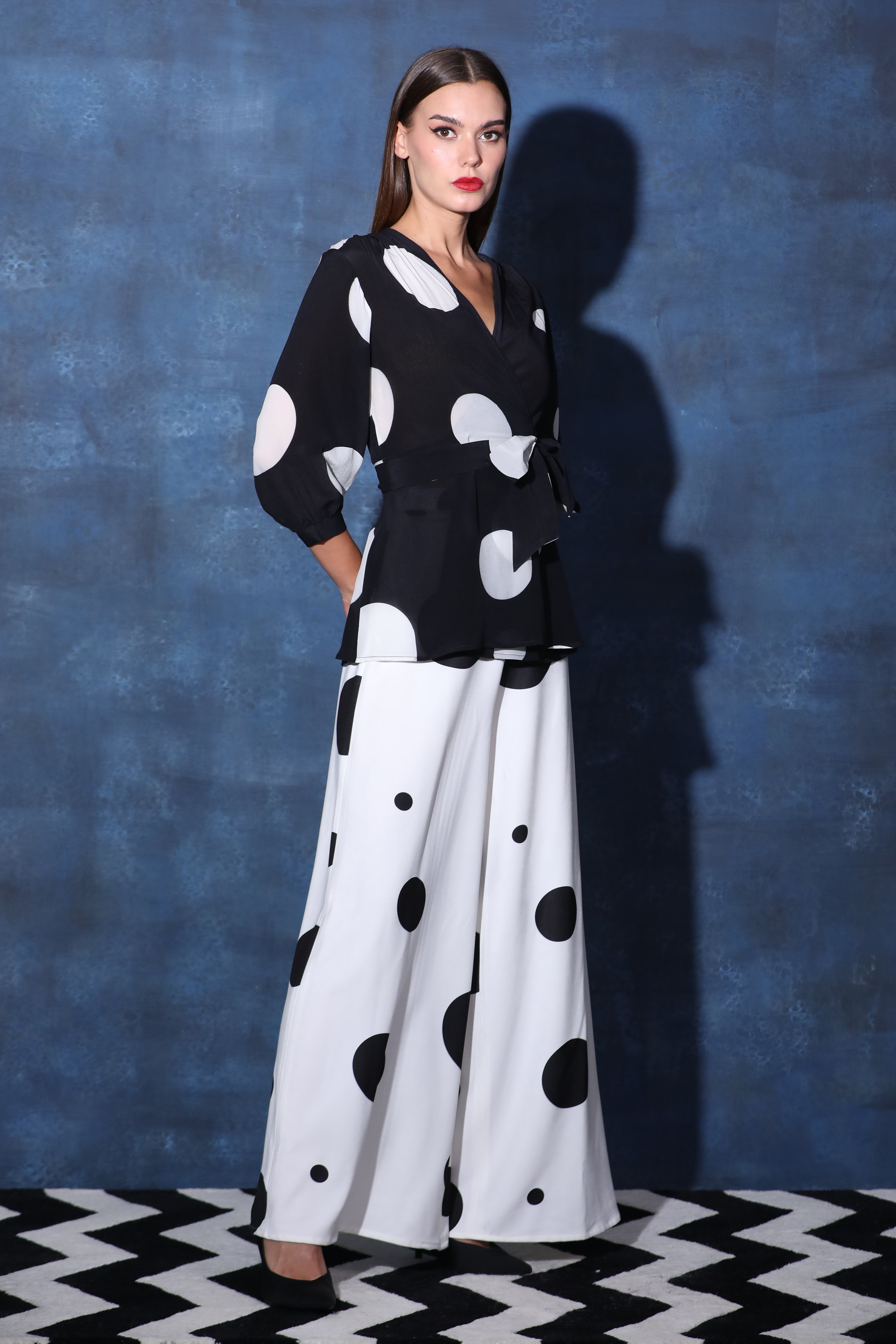 Wrap Black & White Polka Top with Pouf Sleeves & White Flared Pants