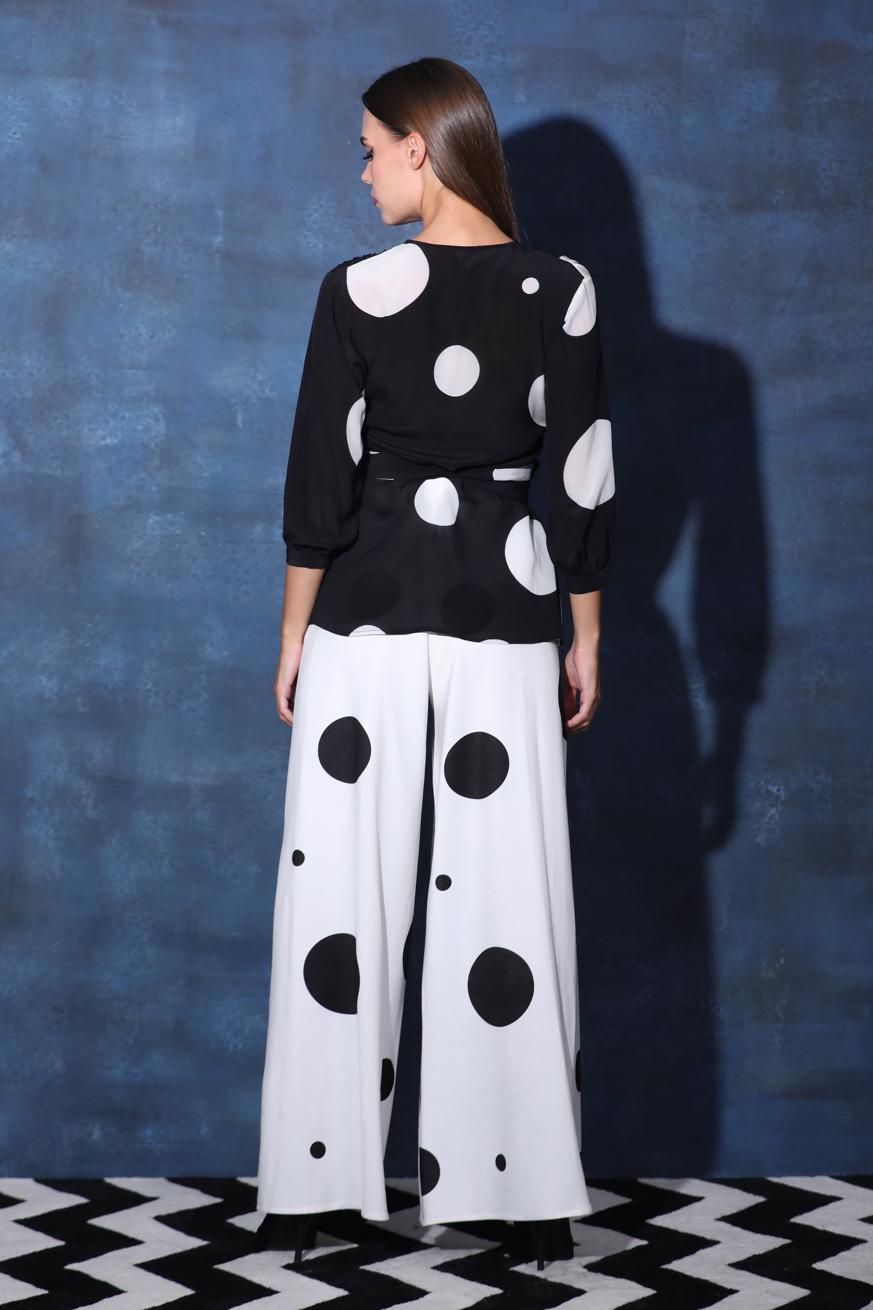 Wrap Black & White Polka Top with Pouf Sleeves & White Flared Pants